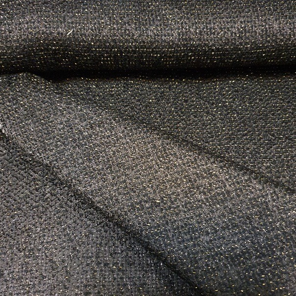 Kostüümiriie sõlmja koega, must,  kuldse brokaatniidiga, laius 136cm. 