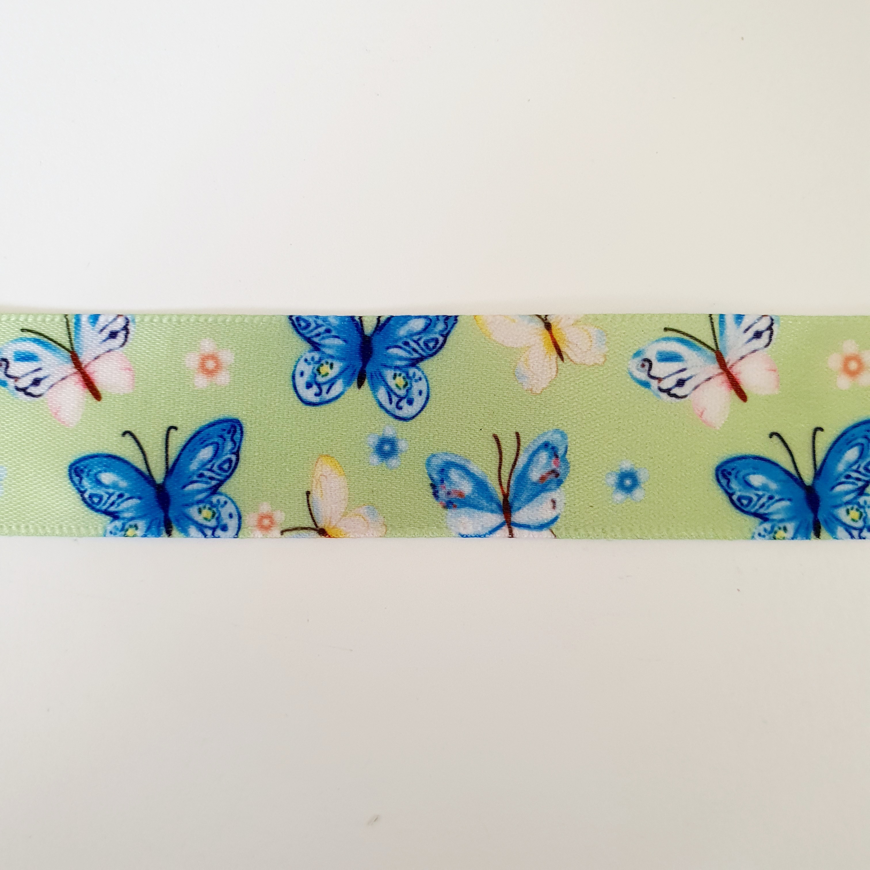 Satiinpael, helerohelisel sinised liblikad, 25mm