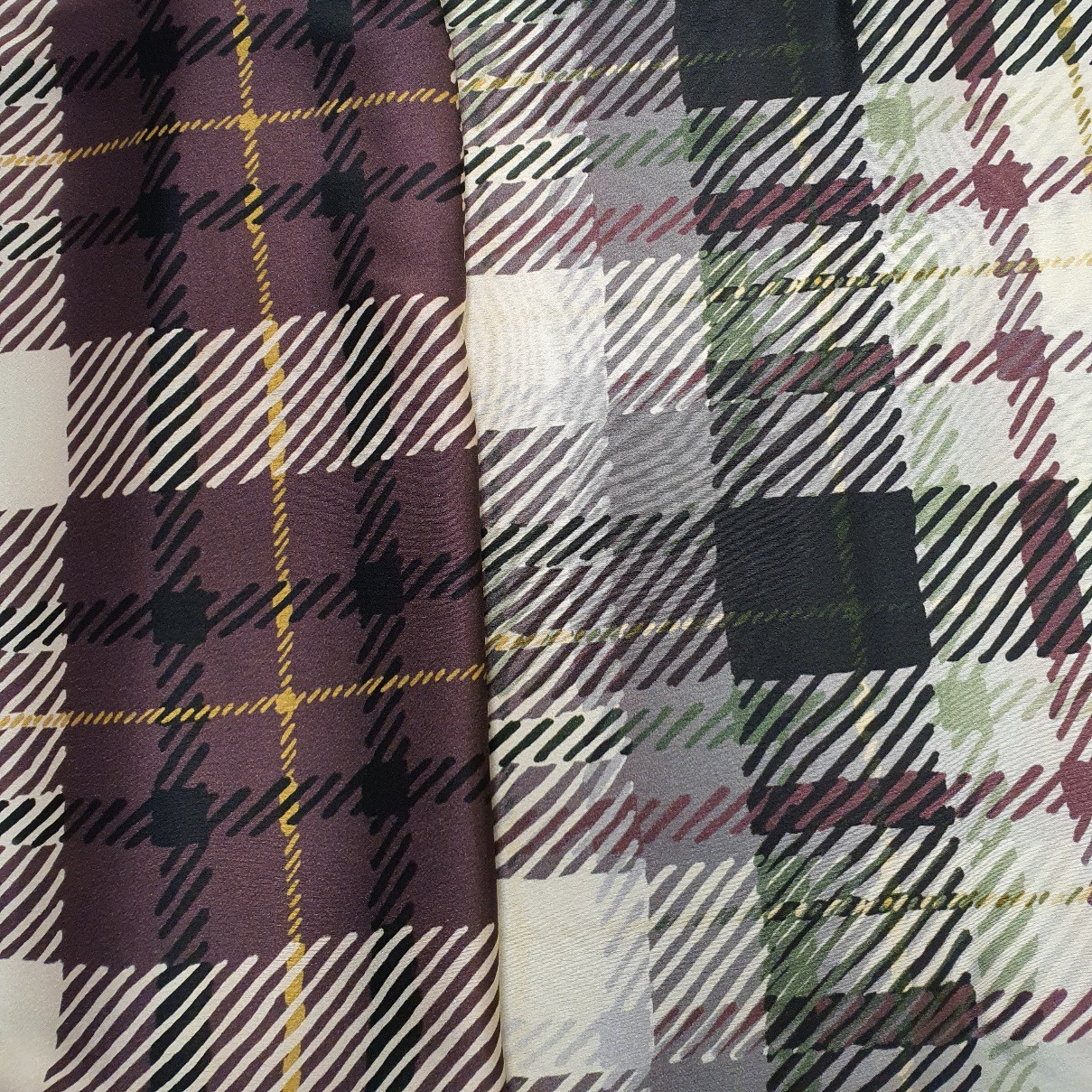 Viskoossatiin, mustad/lillad, ruudud/triibud, laius 134cm.